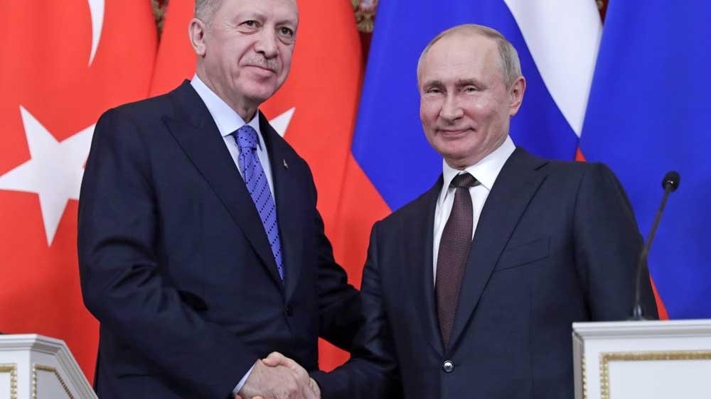 Bild: Handshake zwischen Erdogan und Putin